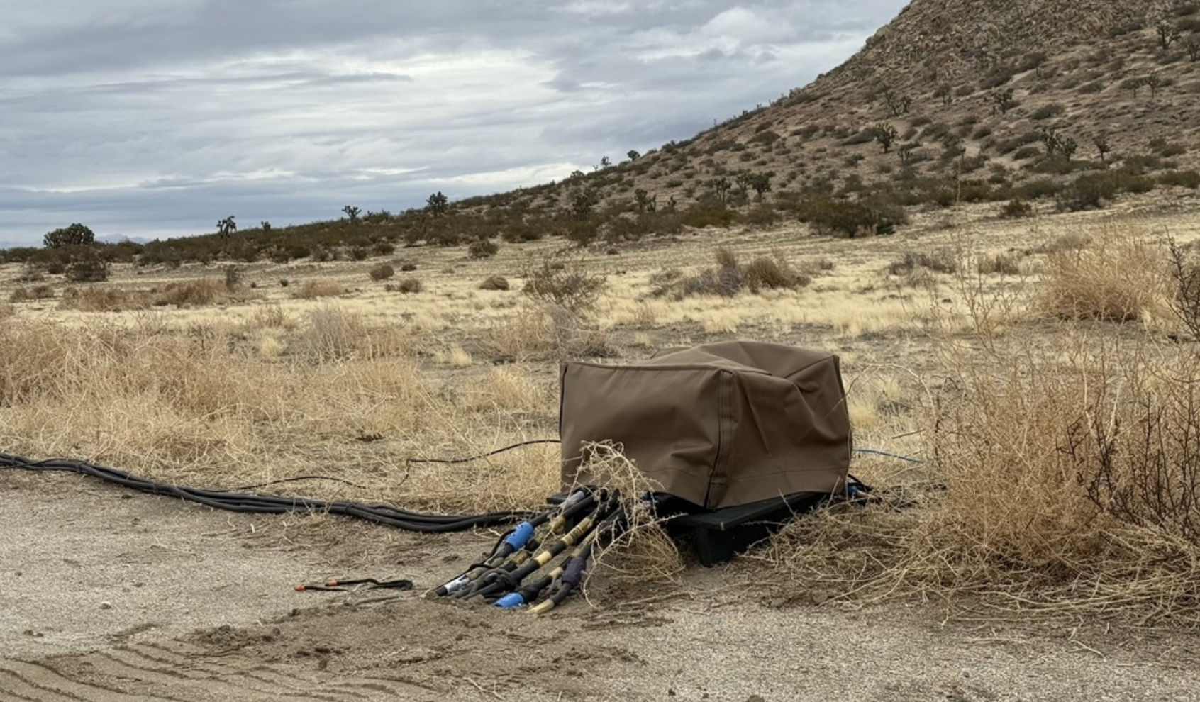 Tan Cover-All blending into the desert