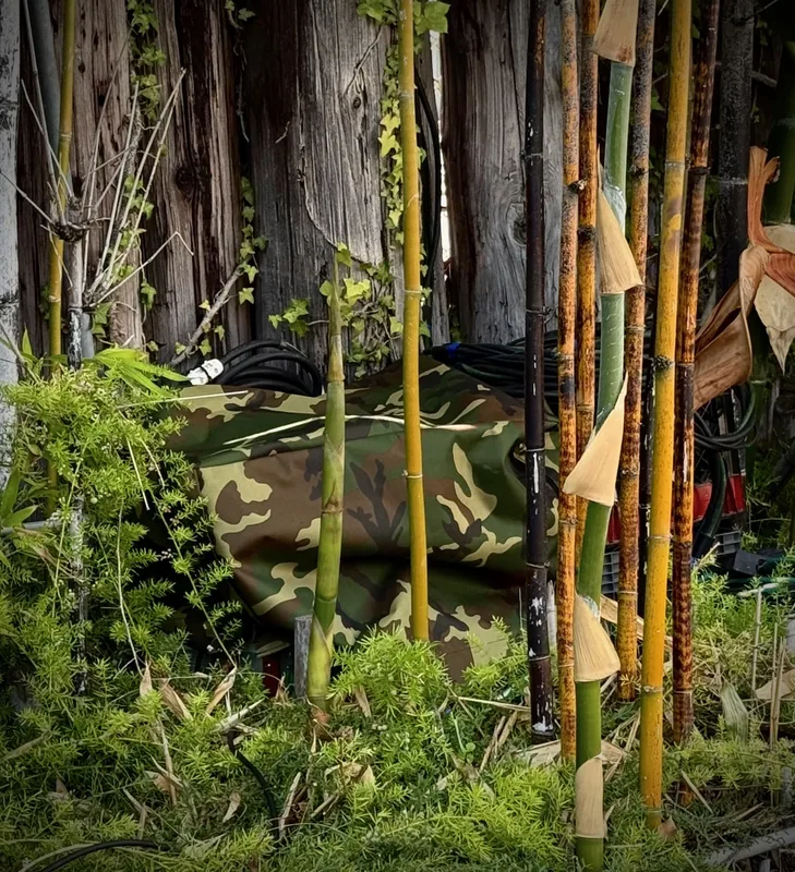 Camouflage Cover-All protecting the gear while blending in.