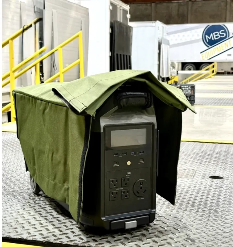Olive Cover-All protecting a battery station.